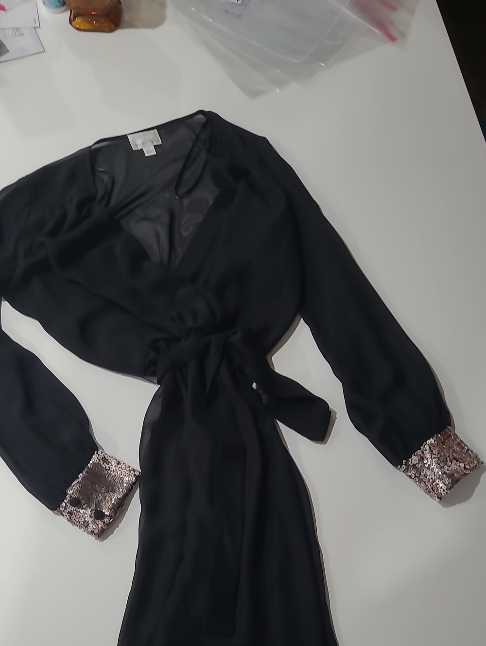 Donna Morgan Black Wrap Romper with Rose Gold Sequin Cuffs
